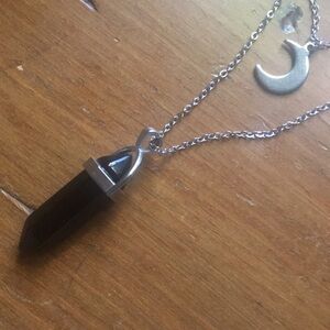 Black semi precious stone pendant with crescent moon necklace.  Silver chain.